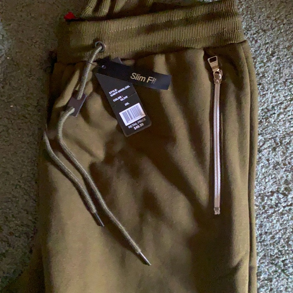 Brand new joggers with zippers